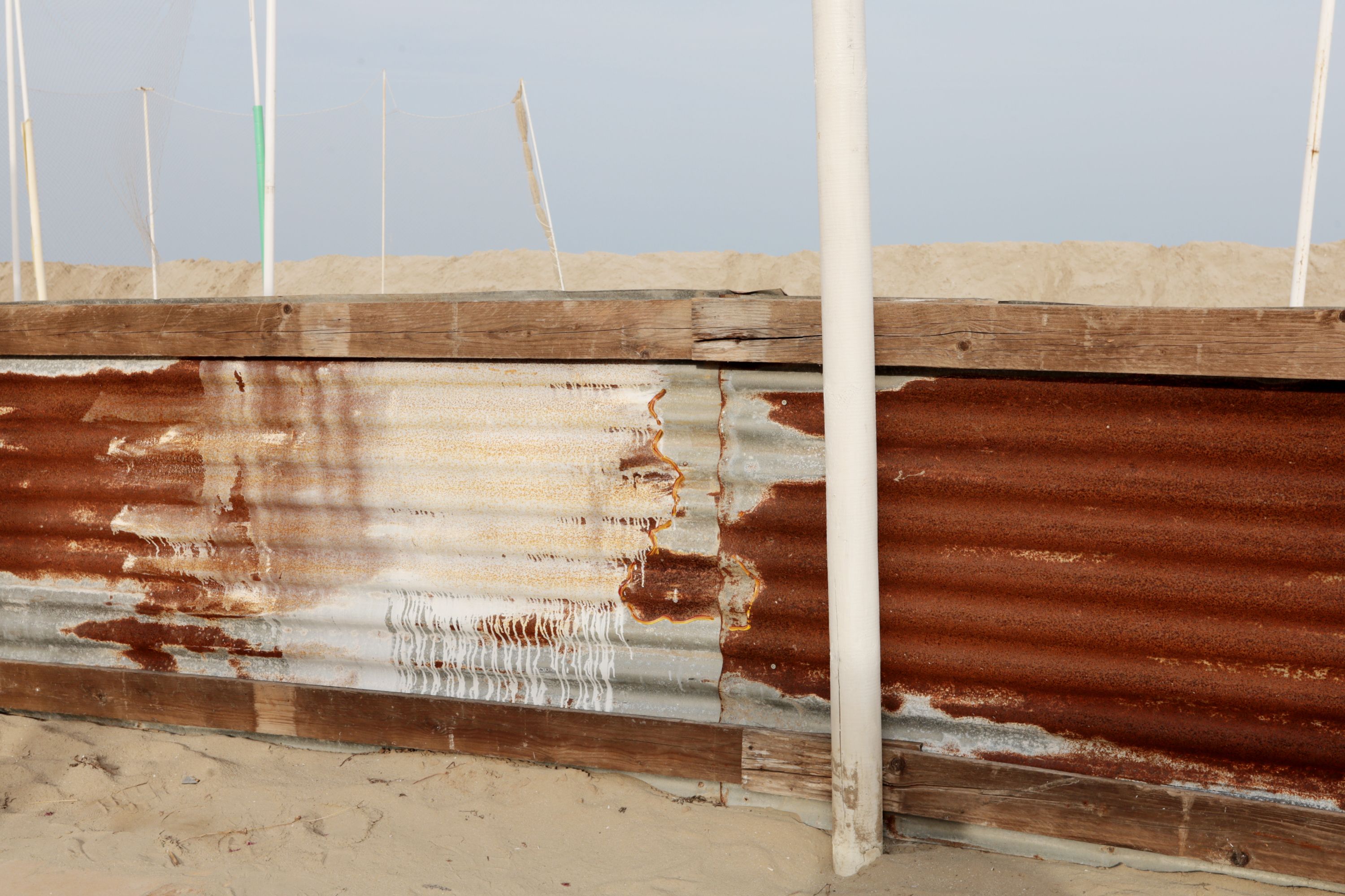off season fence white and brown by Peter Piek
